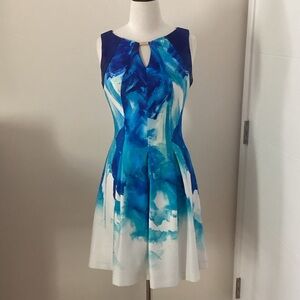 Elegant Blue and White Sleeveless Dress in a funky pattern